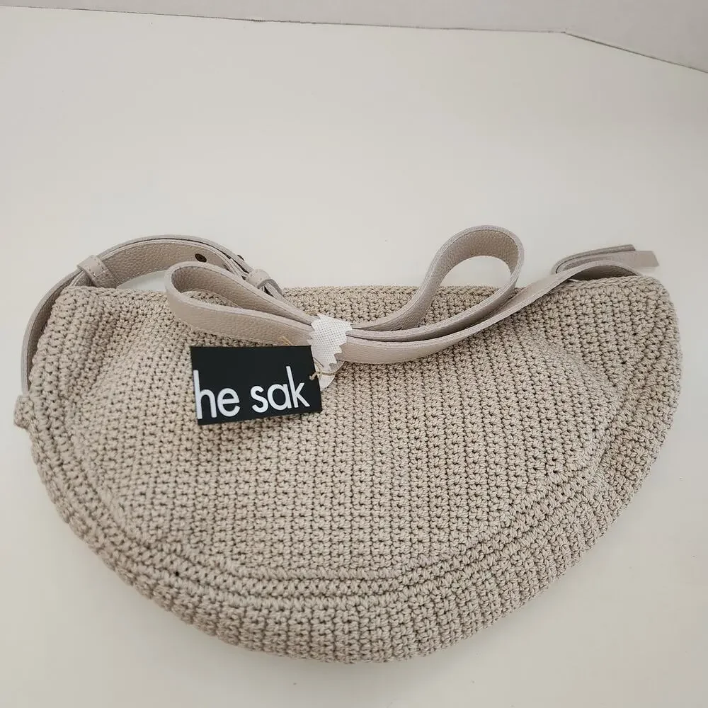 The Sak Tess Crochet Sling - Small Crescent Crossbody Bag with Zipper